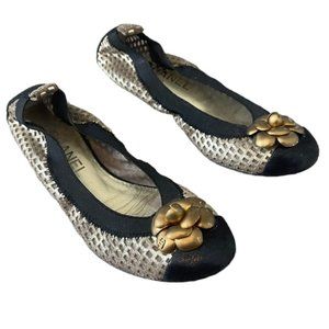 CHANEL Authentic Black and Gold Flats with Flower Accent